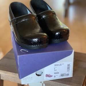 Sanita clog size 40. Black Patent. Never worn, new in box, no smoke no pets